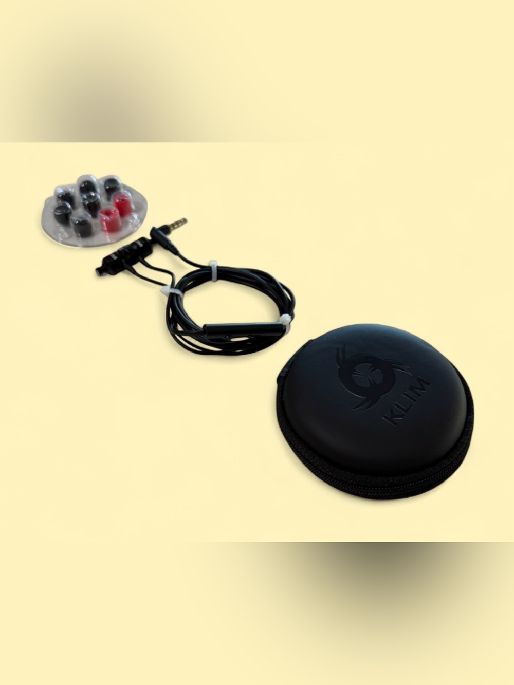 KLIM Fusion wired earbuds with a microphone and a carrying case.